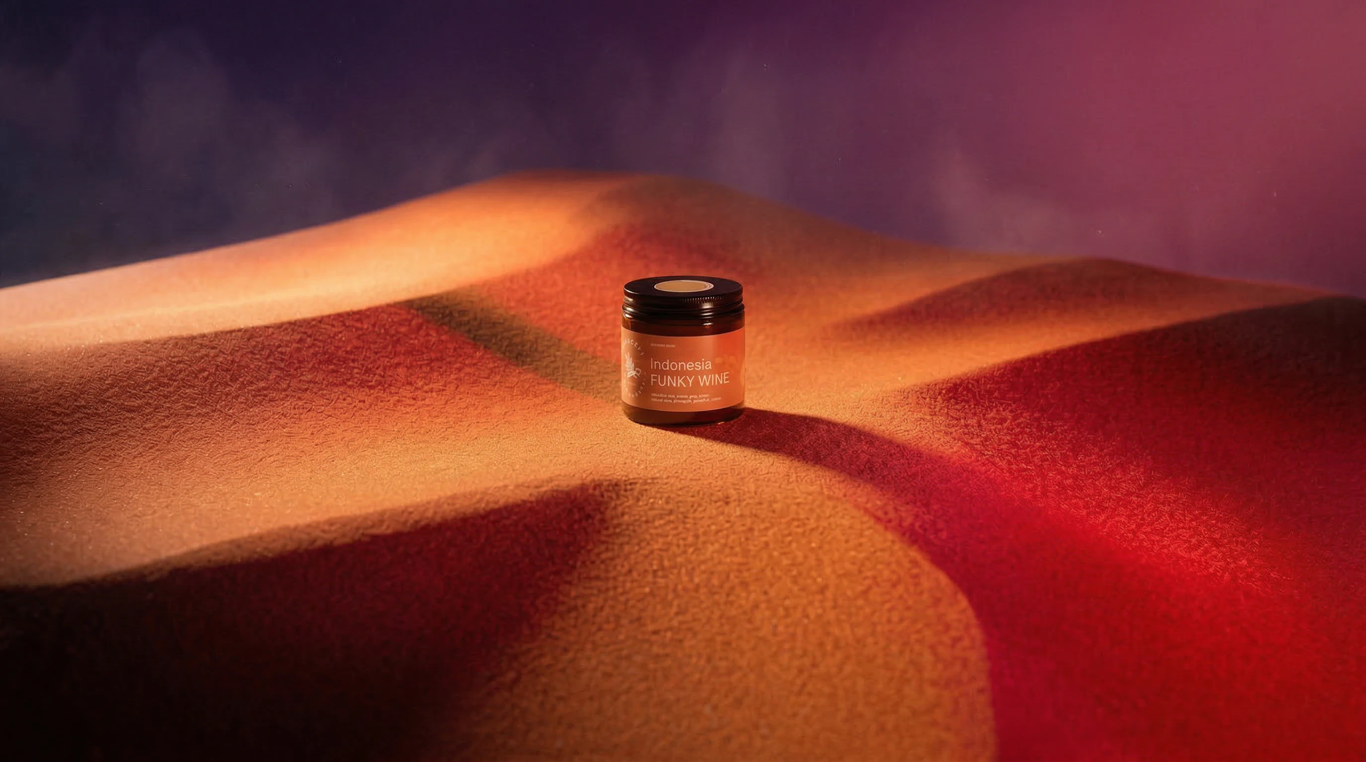 Funky Wine jar nestled in sand dunes under atmospheric purple and orange lighting