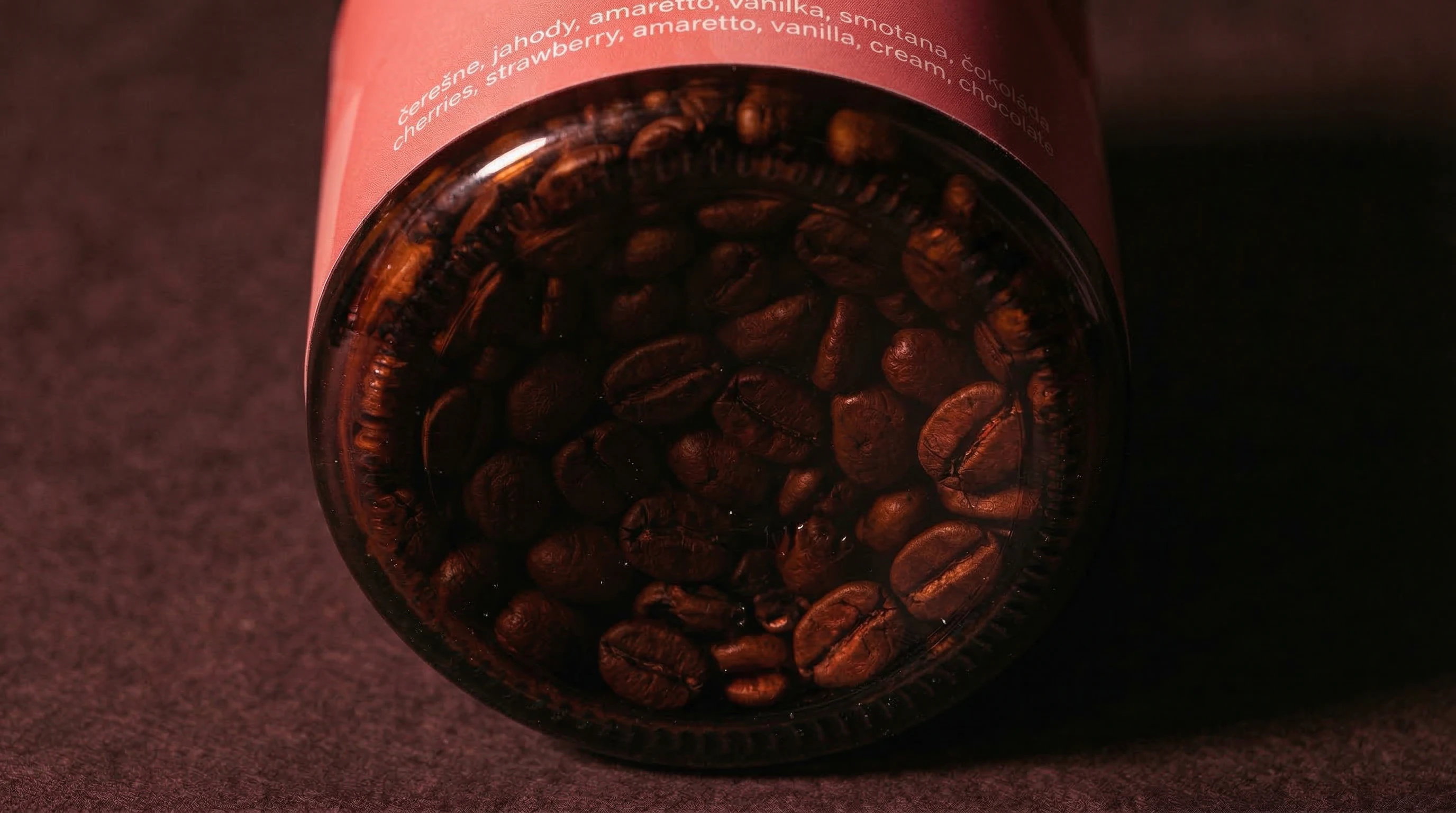 Full-frame macro of Love Potion roasted coffee beans in warm brown tones